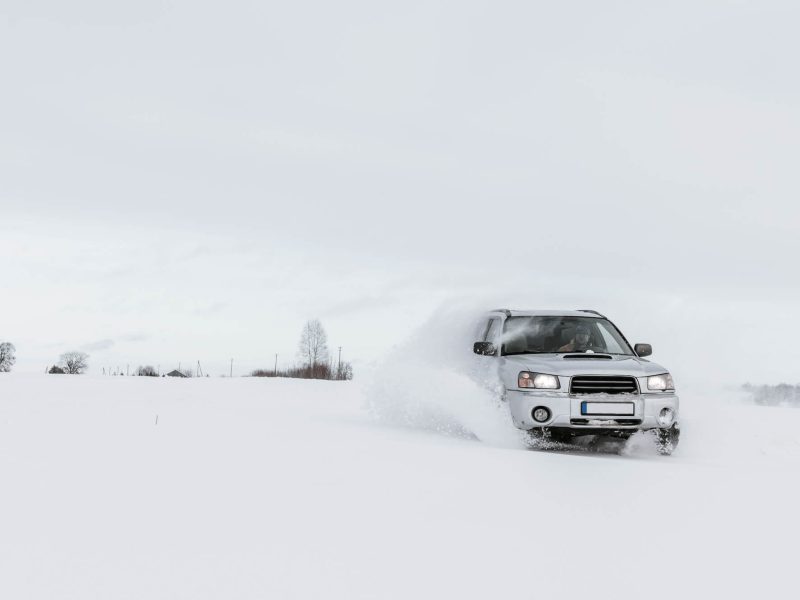 car-driving-on-snow-field-1.jpg